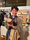 Happy customer proudly holding their Portable Bubble Lamp