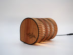 Wooden Bubble Lamp in Timber with laser-cut floral pattern and warm light