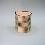 Wooden lamp with a unique design on a gray background