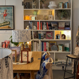 Wiklins and Kent inside store display bookcase