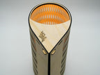 Tall Droplet Lamp wooden vase with intricate cut-out patterns and orange floral interior