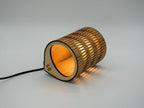Gold Bubble Lamp in Timber with Layered Cylindrical Design and Black Cord