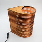 Tall Droplet Lamp: wooden spiral with intricate cut-outs and black cord