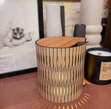 Wooden side table with bubble lamp in natural timber